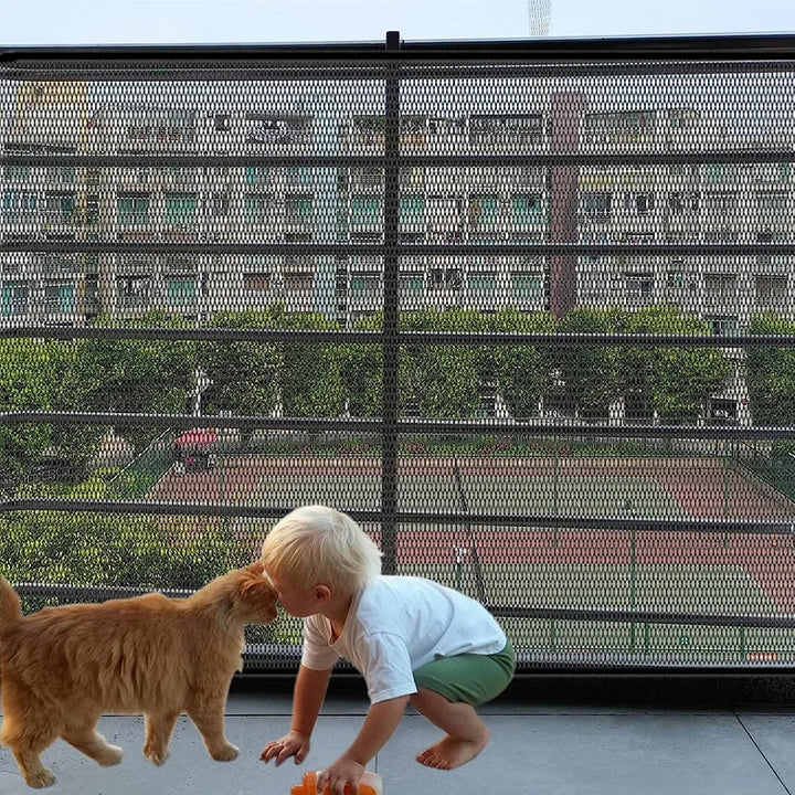 Child and orange cat interacting on a with a Dog Barrier Fence