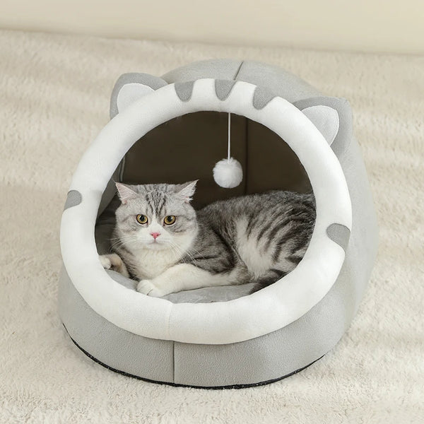 Cat lying in a gray and white Cat Bed Cave