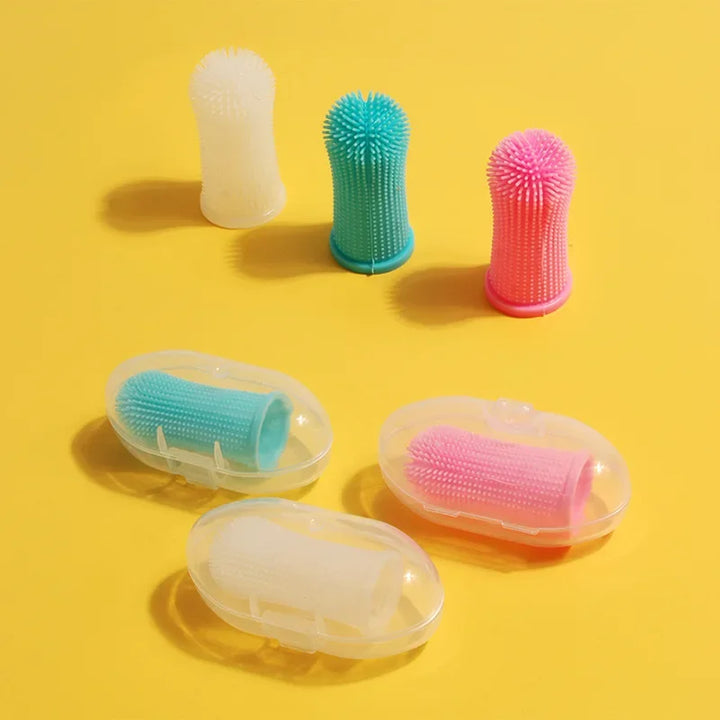 All three Dog Finger Toothbrushes, white, blue and pink