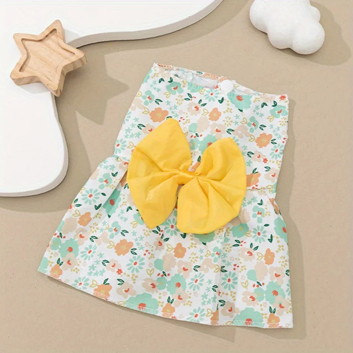 Floral-patterned dress with a large yellow bow dog dress