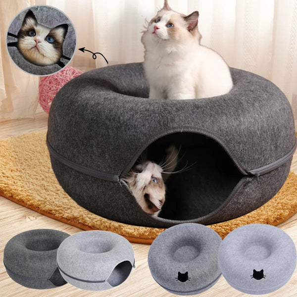 Cat tunnel bed with two cats inside, one peeking out.