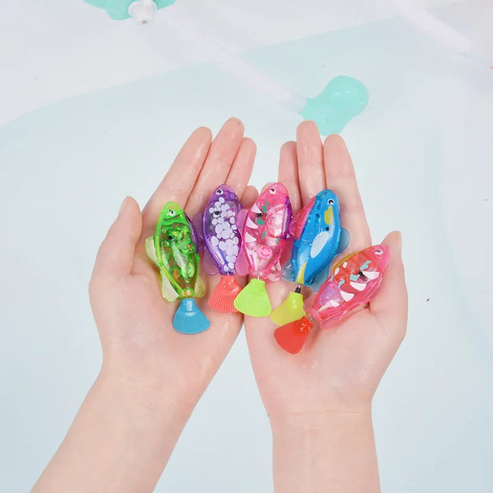 Colorful  cat fish toys held in hands 